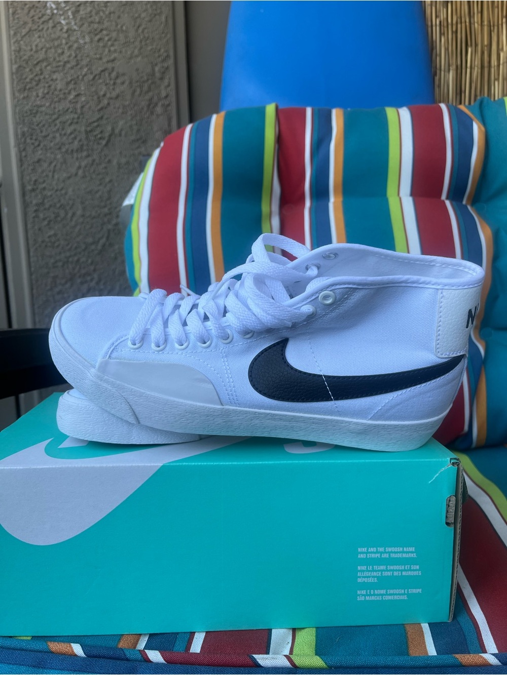 Nike White High-Top Sneakers with Black Swoosh - Picture 4 of 5